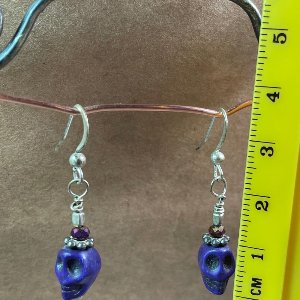 Purple skull earrings